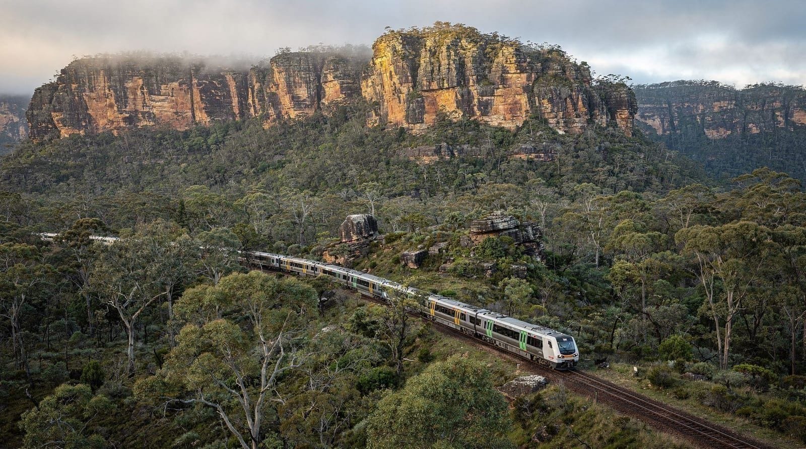 Sydney to Blue Mountains transport — train, car and tour options — Sydney to Blue Mountains in 2026. Train: 2 hours from Central (~AUD 9 Opal). Car